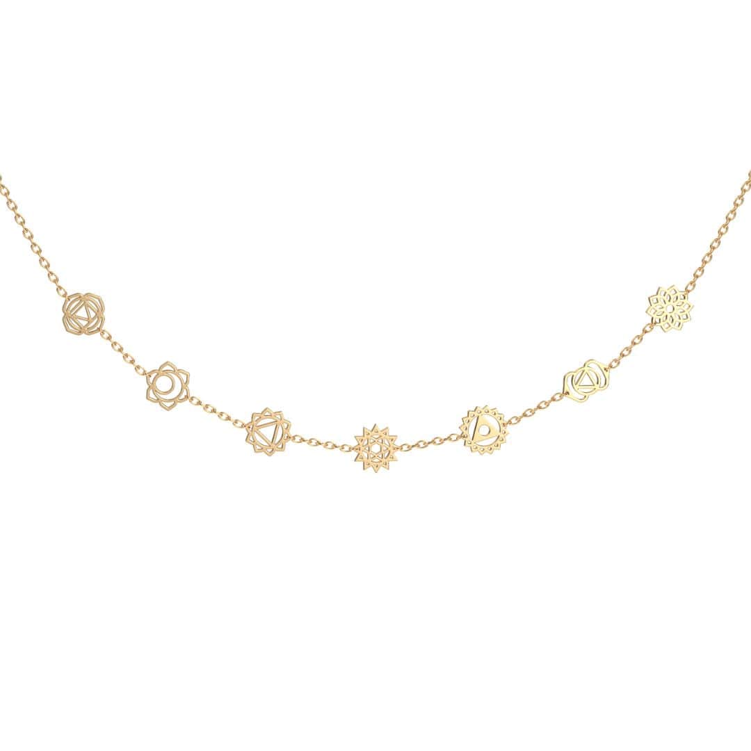 Daya seven-symbol chakra necklace in a delicate gold finish